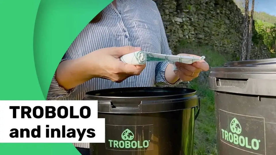 How do you use inlays in TROBOLO composting toilets?