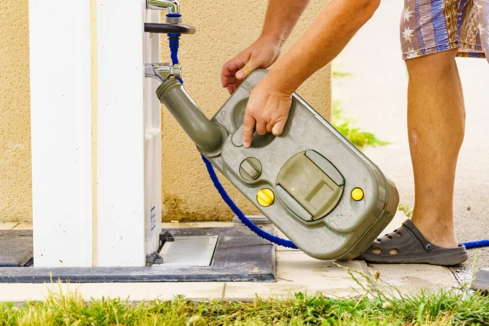 cleaning the chemical toilet