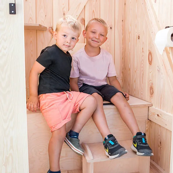 Kids trying the TROBOLO  Kersaboem composting toilet