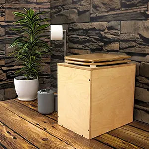 TROBOLO TeraBloem baño seco a lado de una planta