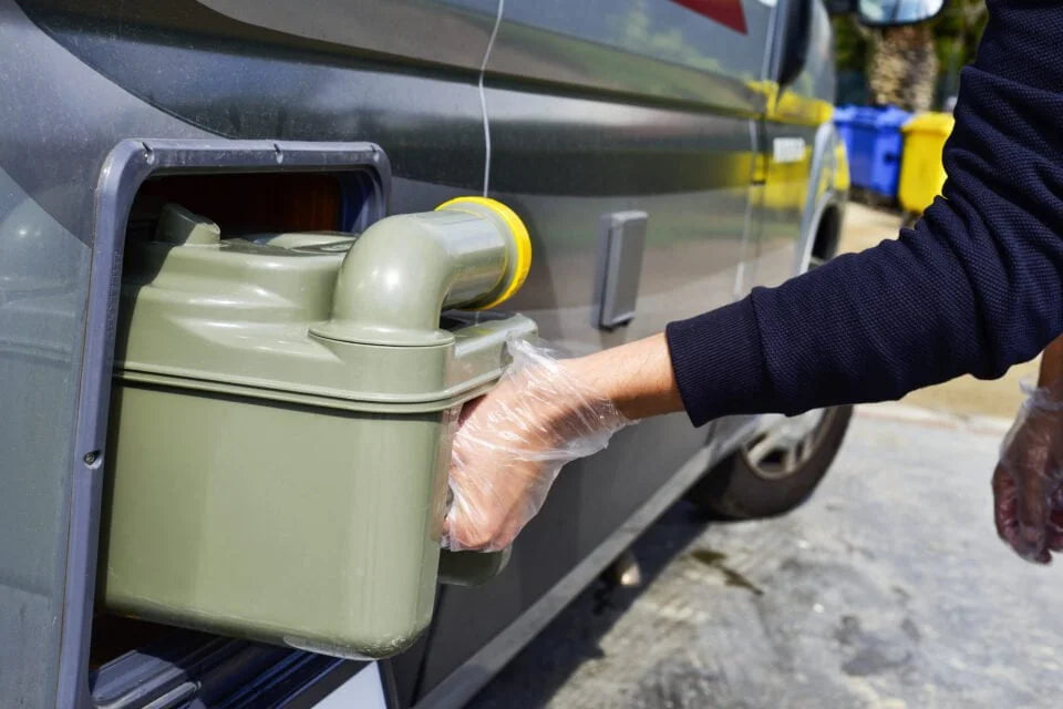 emptying a chemical toilet