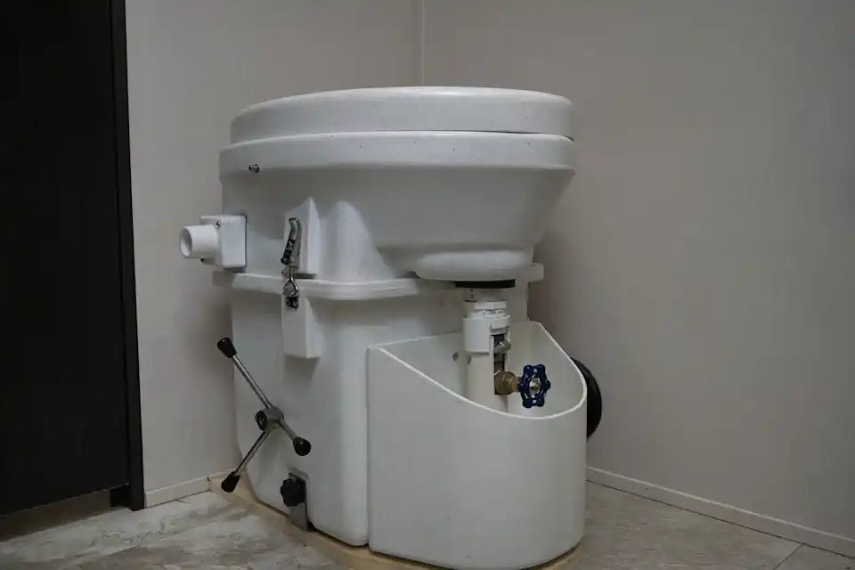 Macerator toilet for RV motorhomes